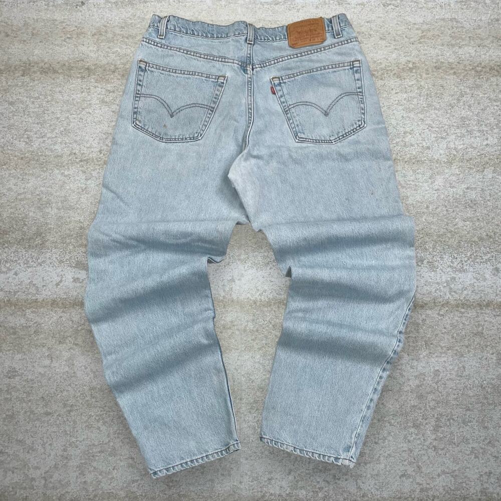 Vintage 90s Levis Jeans 550 38x34 Relaxed Fit Light Wash Denim Made in USA